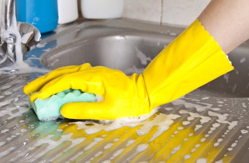 Professional carpet cleaning team working carefully and safely